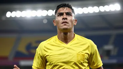 Photorealistic close-up of a 25-30 year old Ecuador national team player in a bright yellow solid jersey, mid-action...